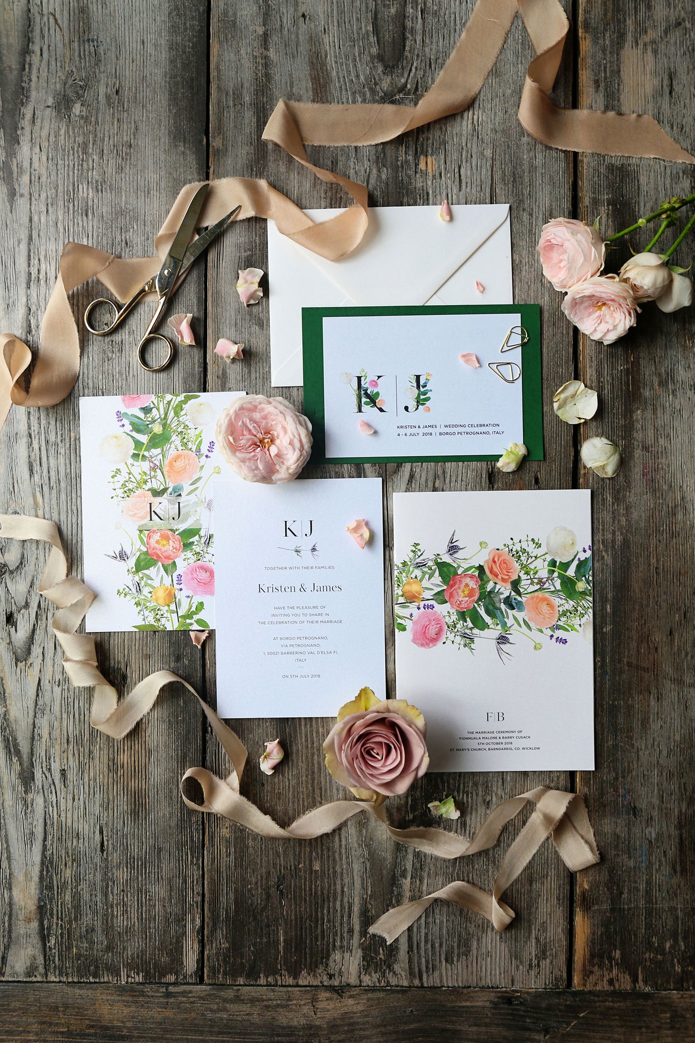 Bloom No. 2 wedding invite design by Marley Press uses clippings of real summer flowers heads in pinks and peach covering the back of the invite arranged in an informal manner on a bed of herbs and eucalyptus leaves. The text is keep simple on the reverse